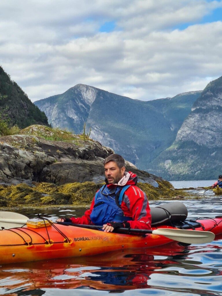 Chris Watson paddling the fjords in Norway.