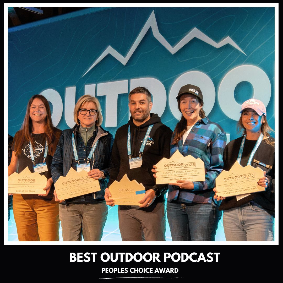 Outdoor Media Awards 2025 winners holding their awards, including Chris Watson of Adventure Diaries.